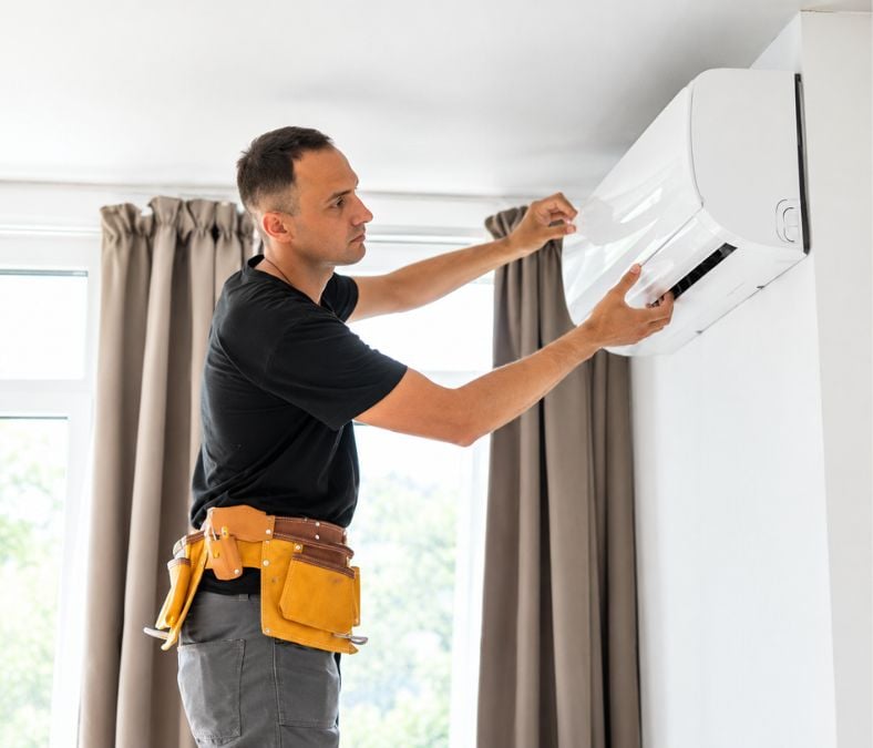 Professional technician diagnosing an air conditioner repair